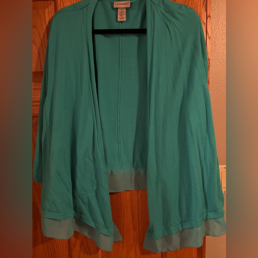 Plus sized woman’s cardigan, Catherine’s 4X, Teal knit with poly extended hem